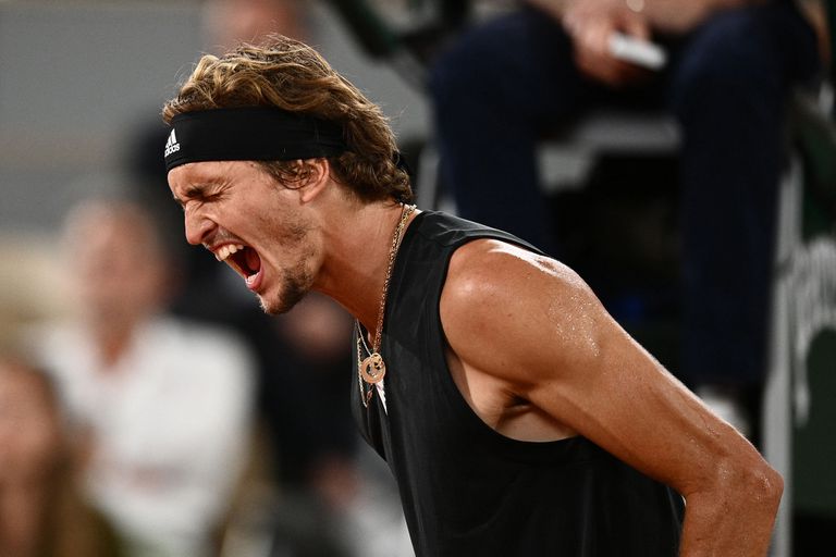Germany's Alexander Zverev reacts after a point against Spain's Rafael Nadal during their men's semi-final singles match on day thirteen of the Roland-Garros Open tennis tournament at the Court Philippe-Chatrier in Paris on June 3, 2022. (Photo by Christophe ARCHAMBAULT / AFP)