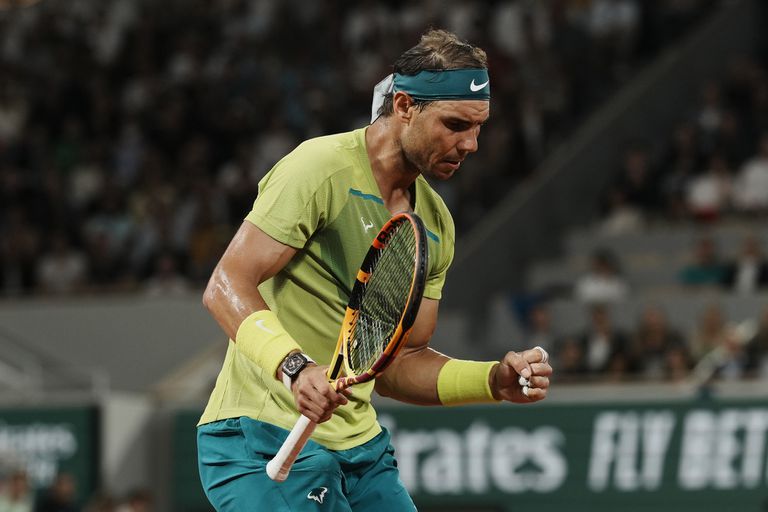 Spain's Rafael Nadal clenches his fist after scoring a point against Germany's Alexander Zverev during their semifinal match at the French Open tennis tournament in Roland Garros stadium in Paris, France, Friday, June 3, 2022. (AP Photo/Thibault Camus)